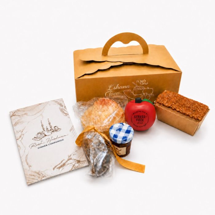 Apple-shaped Rosh Hashanah stress ball with “Wishing You a Stress-Free Year” and “L’shana Tova U’Metukah”