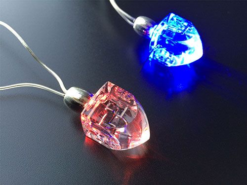 Battery-powered LED menorah necklace for Chanukah celebrations