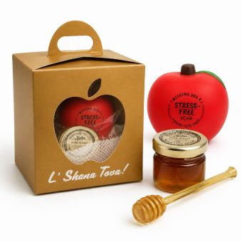 Apple-shaped Rosh Hashanah stress ball with “Wishing You a Stress-Free Year” and “L’shana Tova U’Metukah”