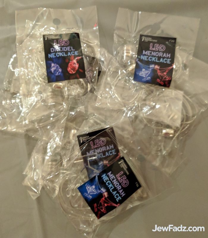 LED menorah necklace in packaging
