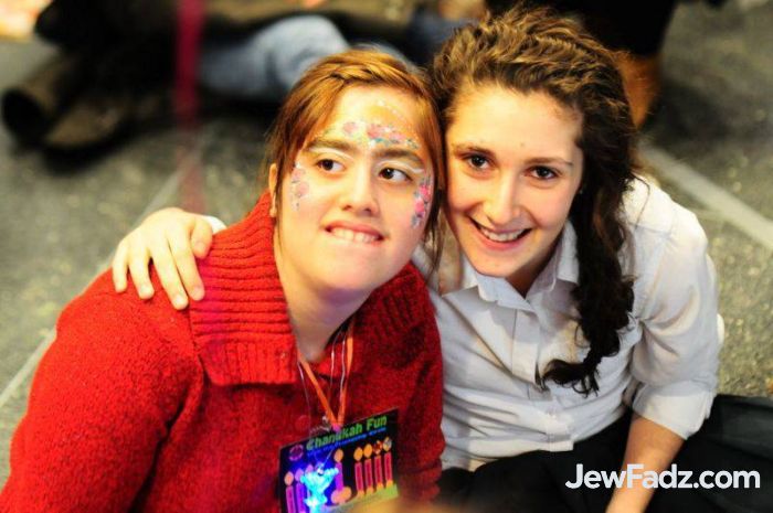 LED Menorah necklace at a Chanukah party